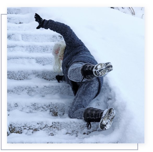 Woman falling down steps covered in ice