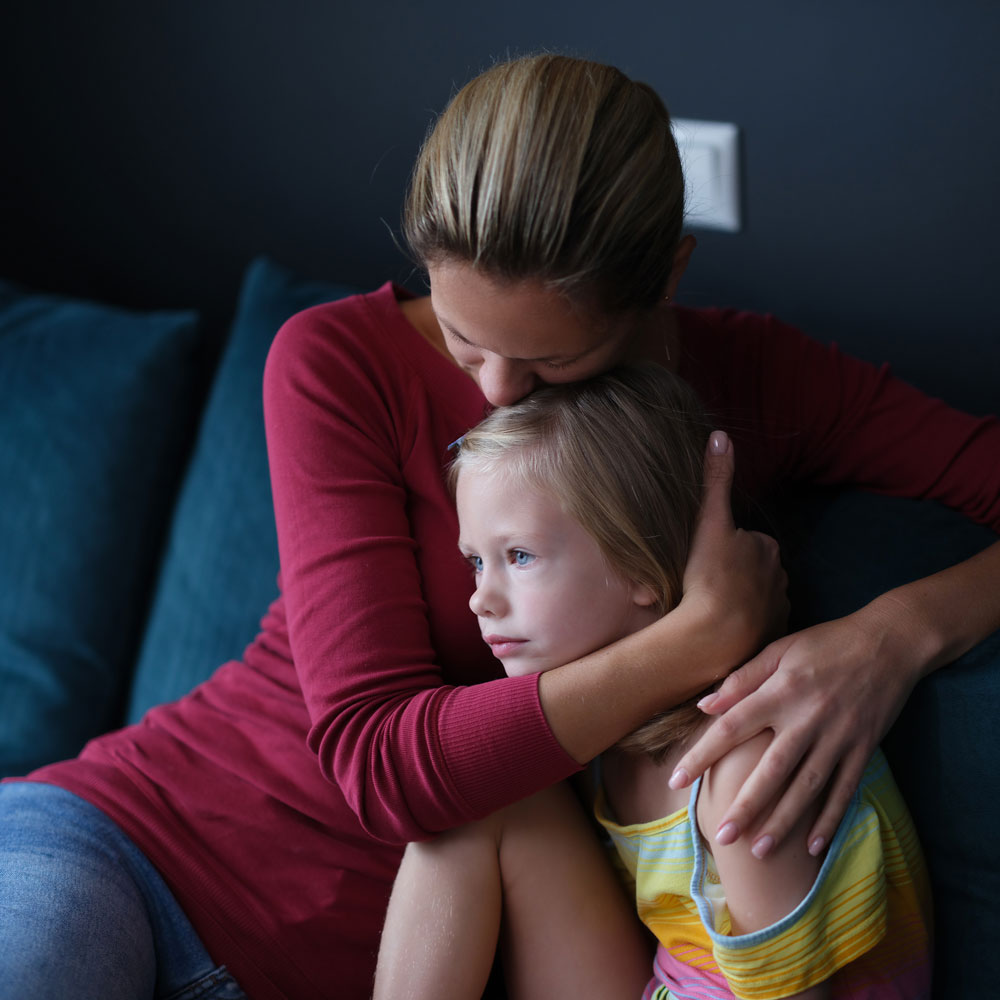 Woman holding her child