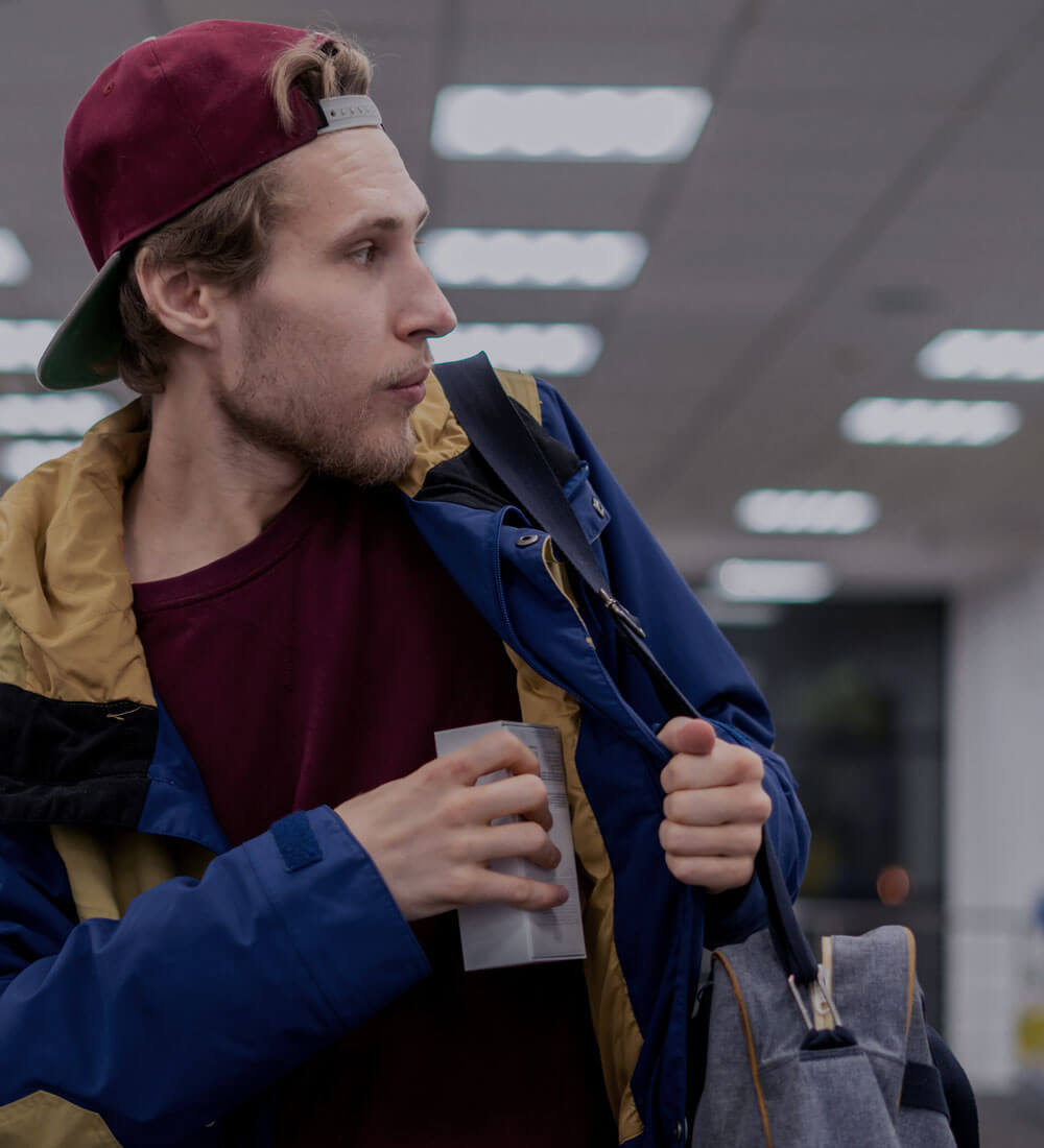 Young man shoplifting